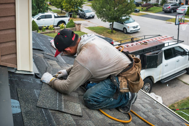 Professional Gutter Repair And Installation technician working in Marriottsville, MD